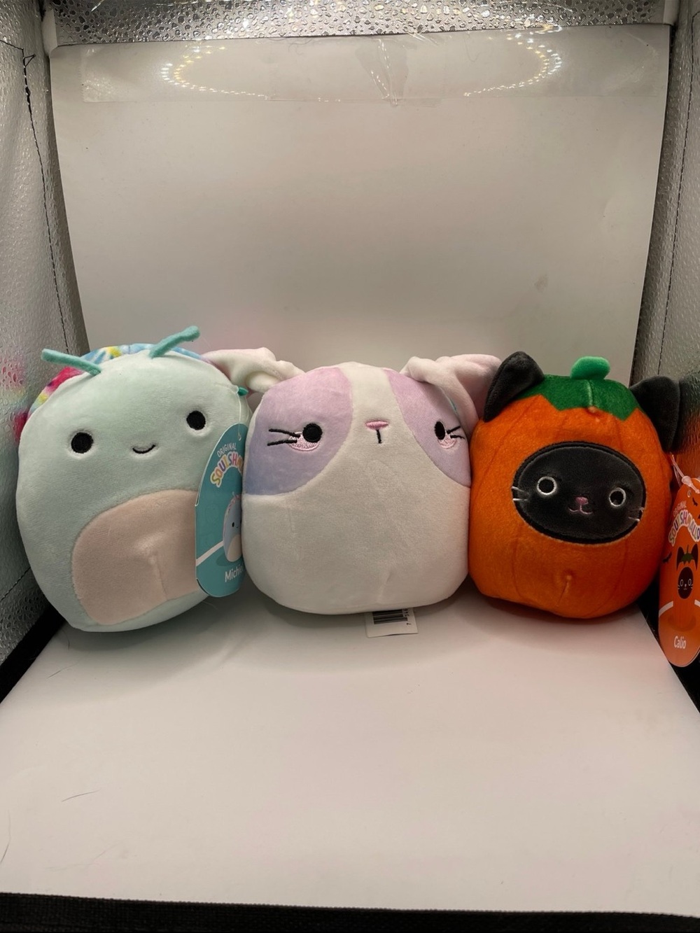 Squishmallows Mint Narwhal, White/Pink Bunny, and Orange Pumpkin Cat Plush Trio